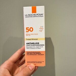 Anthelios Light Fluid Sunscreen SPF 50 - new in box - tinted